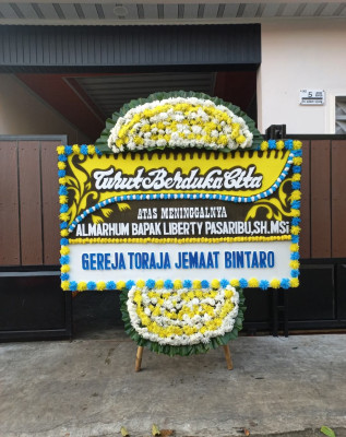 Papan Bunga Duka di Mlandingan