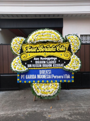 Papan Bunga Duka di Mlandingan