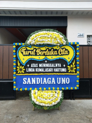 Papan Bunga Duka di Mlandingan